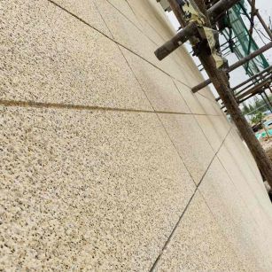 衡阳 黄金麻花岗岩荔枝面外墙干挂石材效果示例