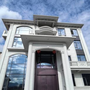 衡阳白麻别墅外墙干挂石材效果示例