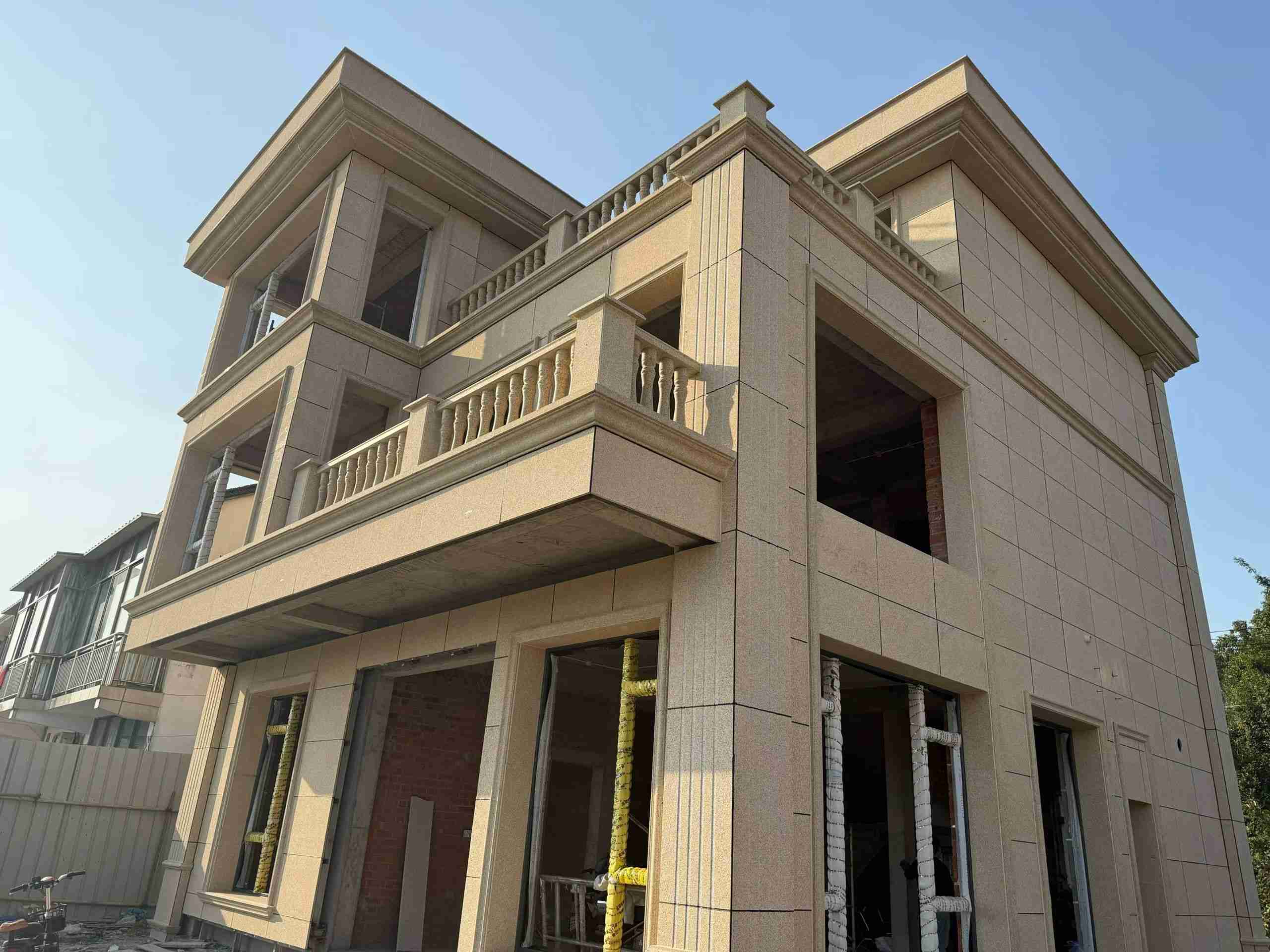 衡阳 黄金麻花岗岩石材荔枝面外墙干挂效果展示